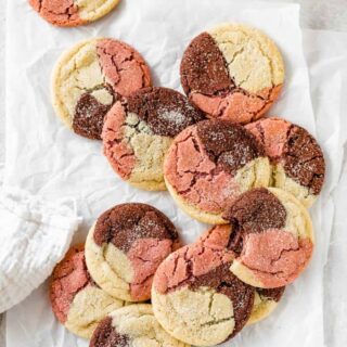 Neapolitan cookies in a beautiful design against white background ready to serve