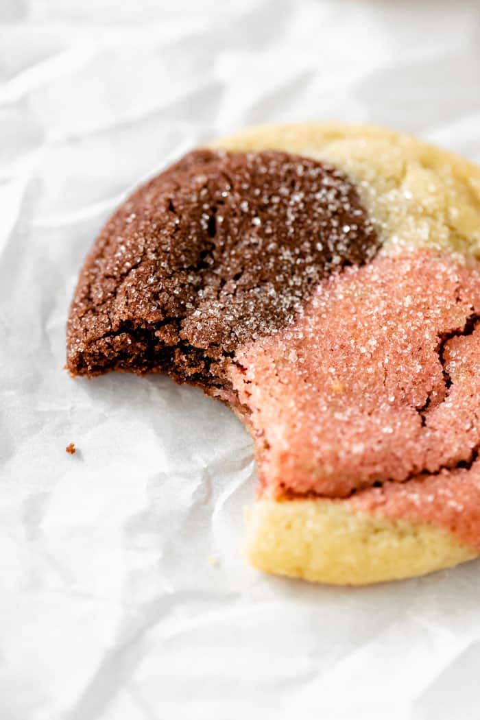 A close up of a cookie with a bite taken out