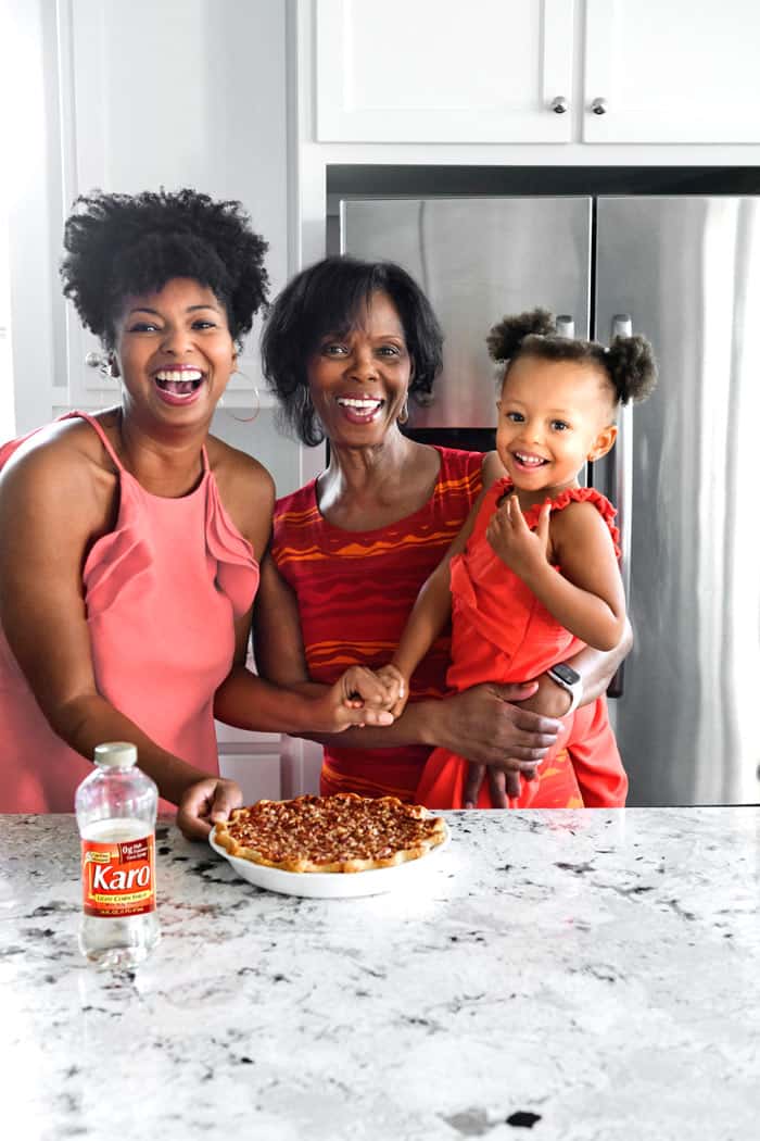 Jocelyn Delk Adam's mother and daughter on Thanksgiving after baking a pie for the holiday