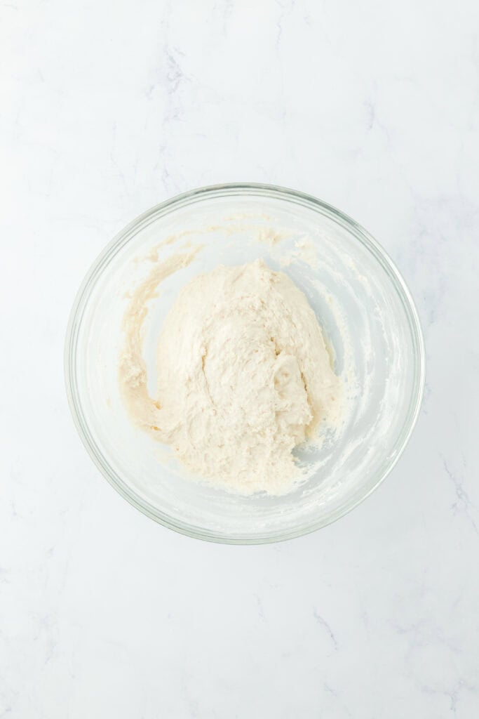 7 up biscuit dough in a glass bowl on white countertop