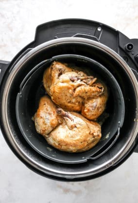 Two small hens in an instant pot after being pressure cooked