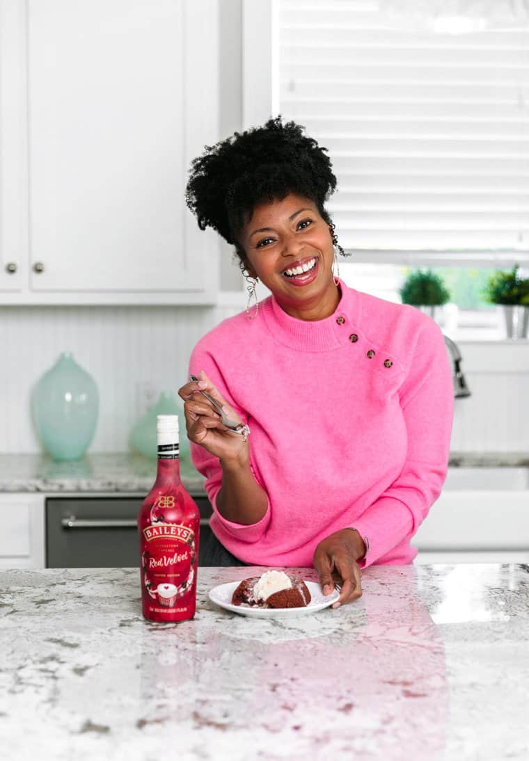 Jocelyn Delk Adams eating one of her red velvet lava cakes