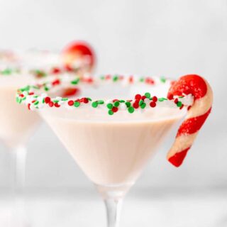 A close up of two martini classes filled a cream Irish cream cookie cocktail