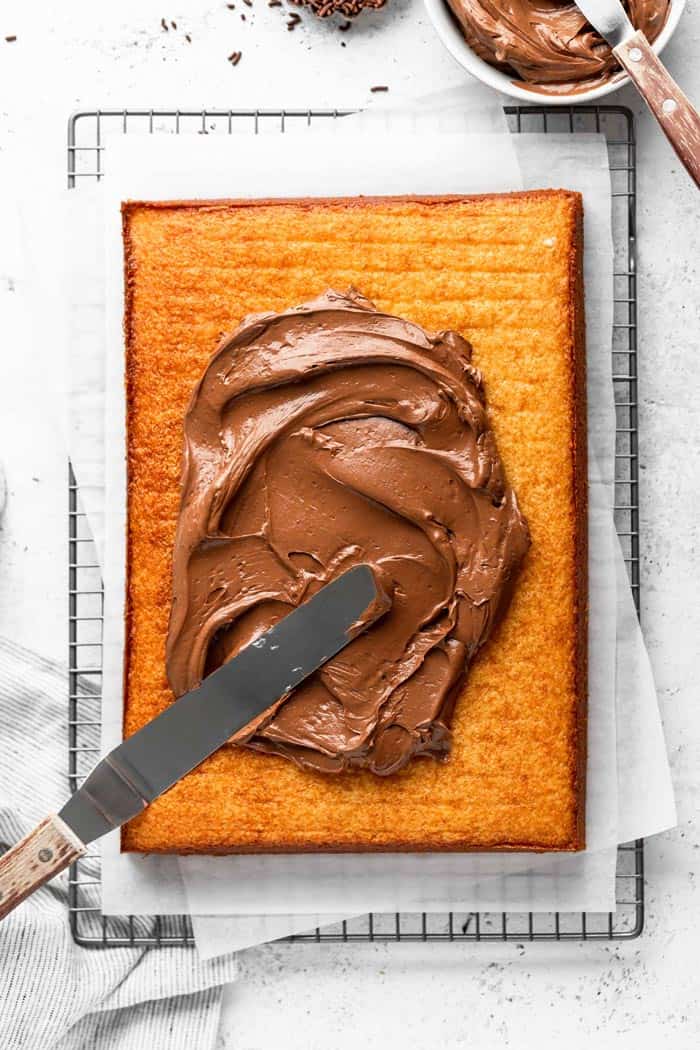 A delicious chocolate buttercream spread on a sheet cake