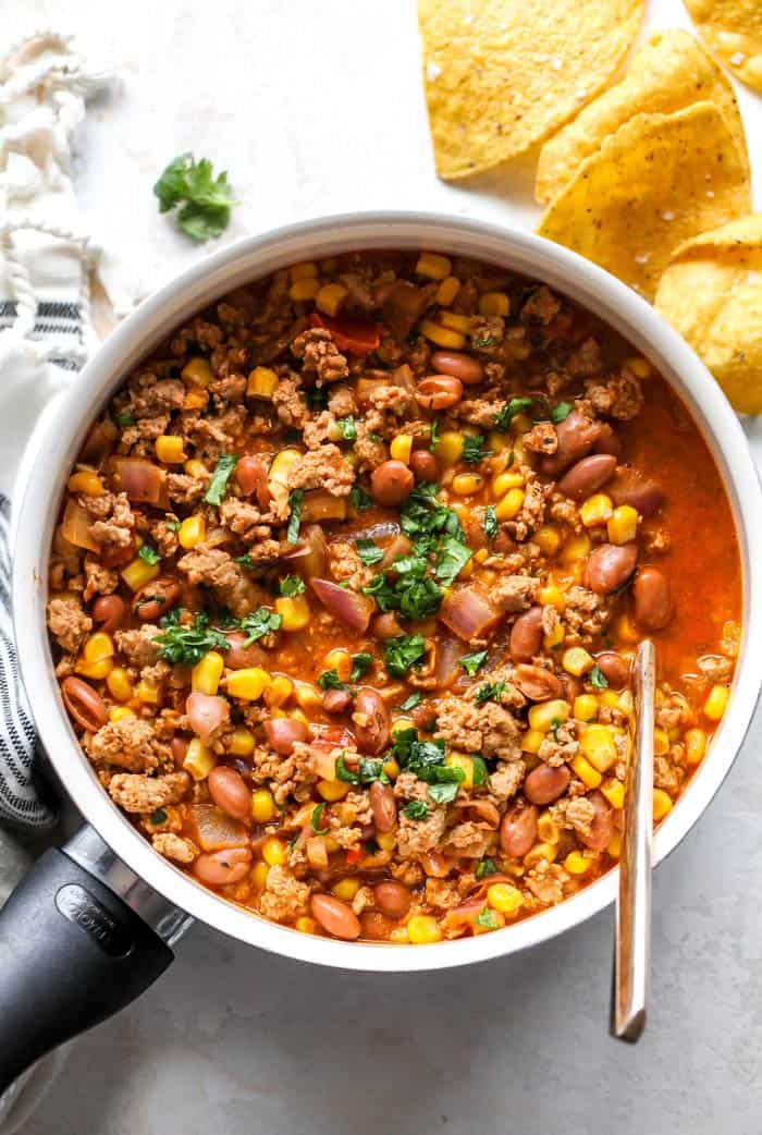 A large pot of easy soup with taco flavors being stirred