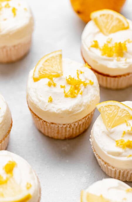 A gathering of cupcakes with lemon flavor ready to be eaten