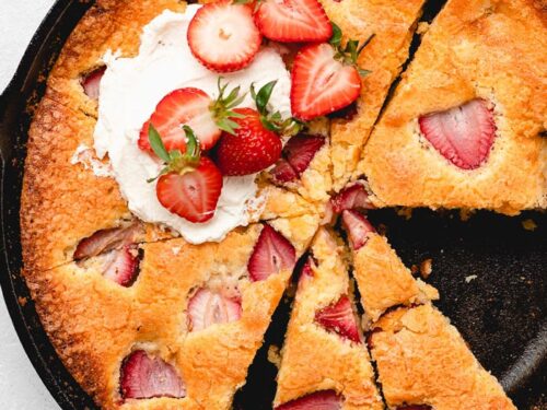 https://grandbaby-cakes.com/wp-content/uploads/2021/02/Strawberry-Cornmeal-Goat-Cheese-Skillet-Cake-11-500x375.jpg