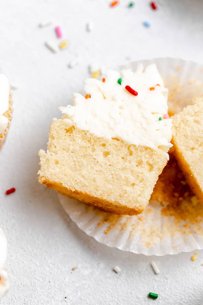 A close up of easy vanilla cupcake cut in half