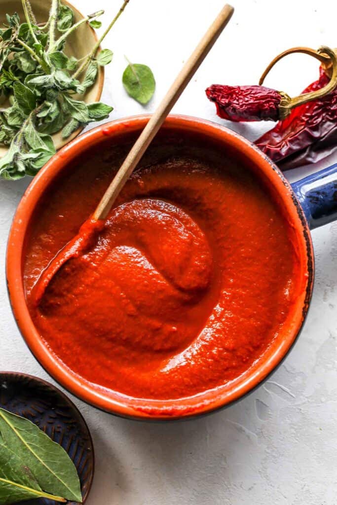 Tomato paste in a bowl to make birria tacos.