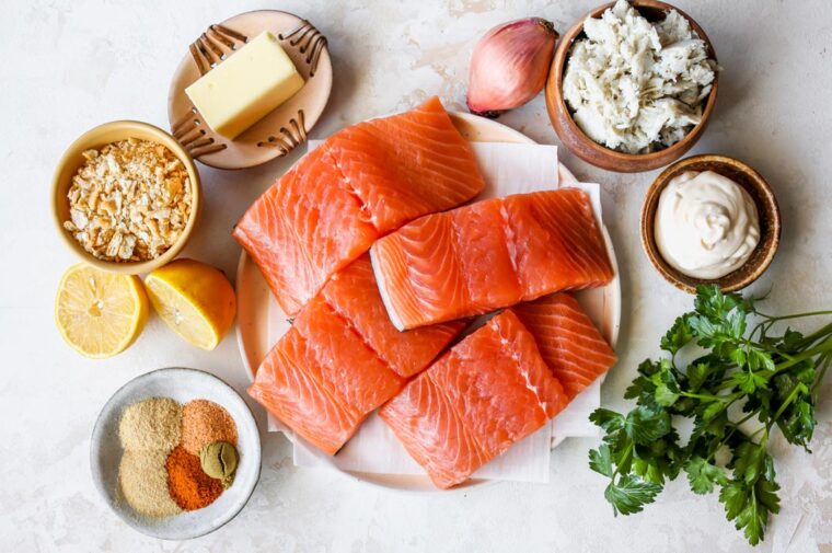 Fresh filets of salmon, herbs, spices, butter, crab and bread crumbs to make a salmon recipe