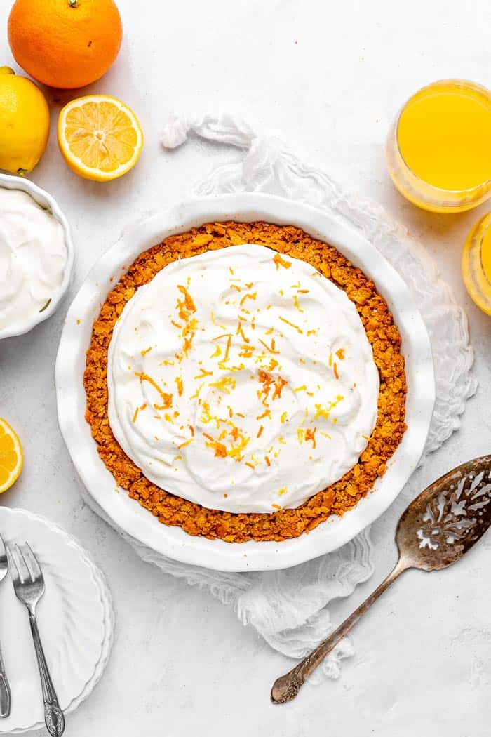 A delicious Atlantic beach pie with oranges and lemons surrounding it before serving