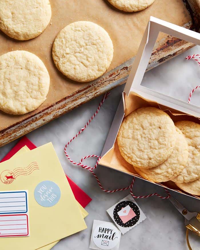 Lemon tea cake cookies being packaged to ship to someone