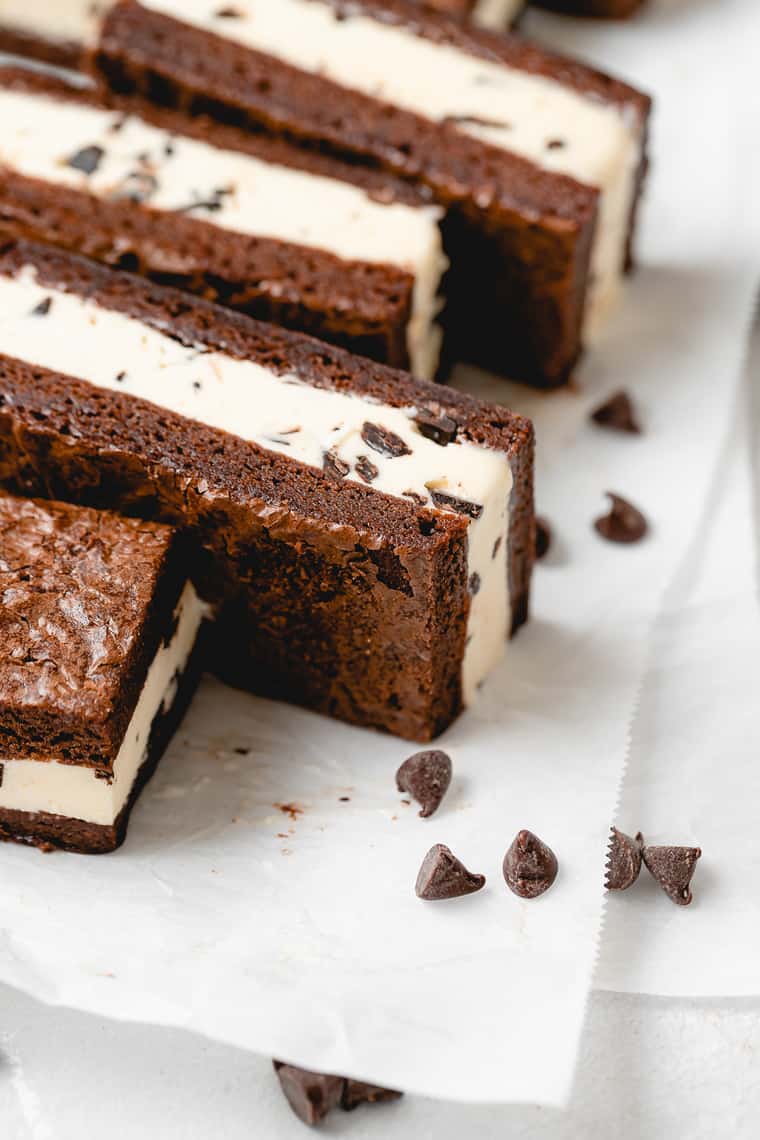 Brownie sandwiches with chocolate chip ice cream laying down ready to enjoy