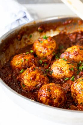 A pan of meatballs in a homemade bbq sauce ready to serve