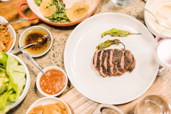 An overhead spread of filet mignon and sides