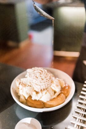 A Bananas Foster with caramel sauce poured on top