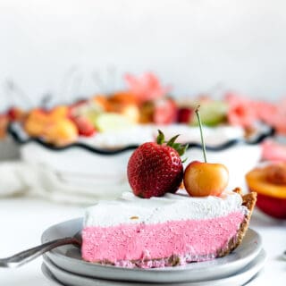 Slice of Fruit Punch kool-aid pie against white background