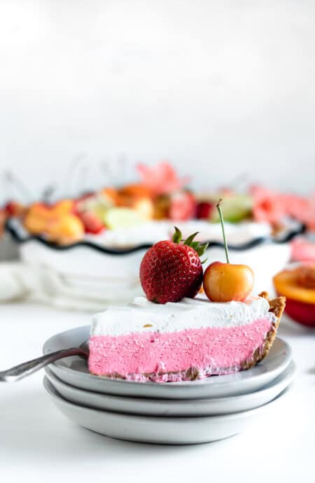 Slice of Fruit Punch kool-aid pie against white background