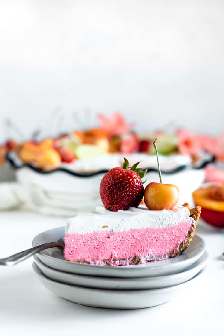 Slice of Fruit Punch kool-aid pie against white background