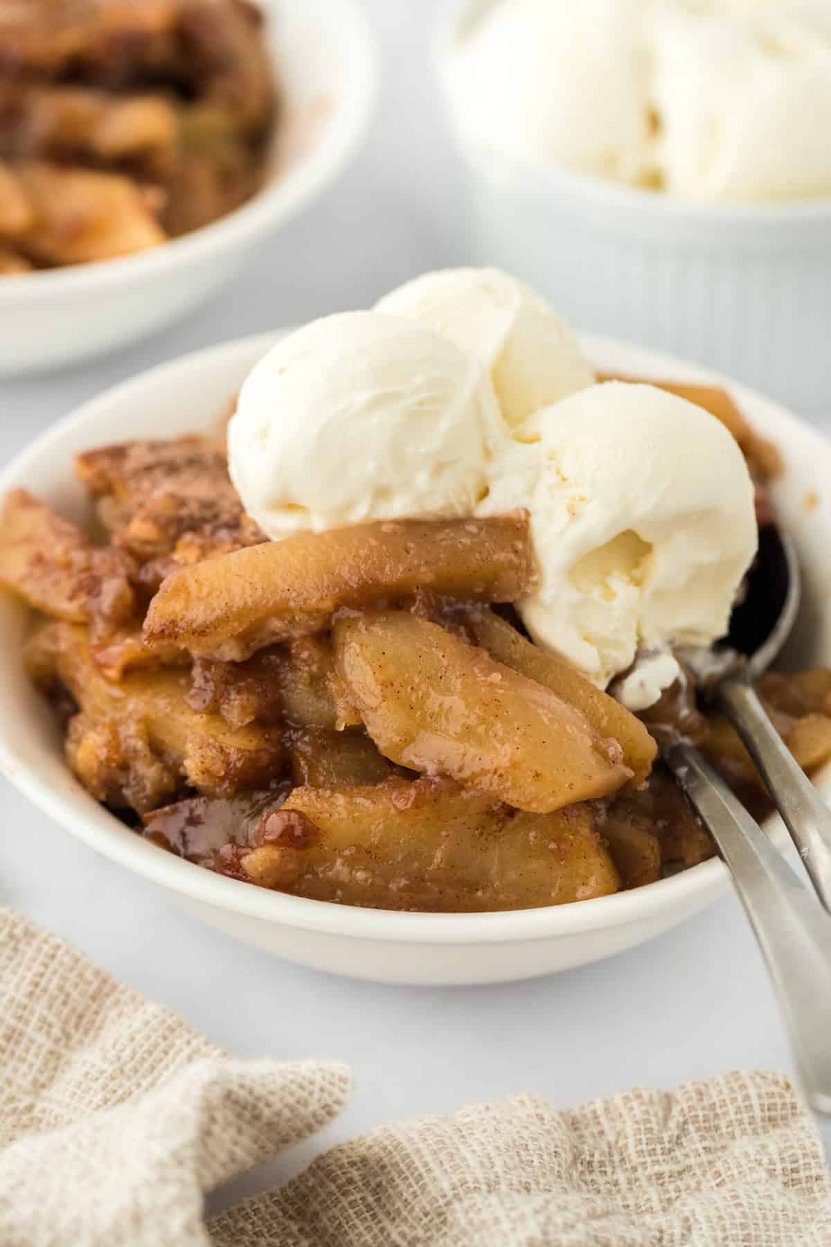 Vanilla ice cream added to the best apple cobbler ready to serve up