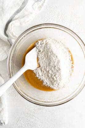All purpose flour adding to brown butter with a white spatula