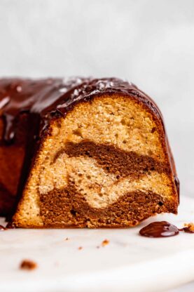 A close up of a sliced marble cake