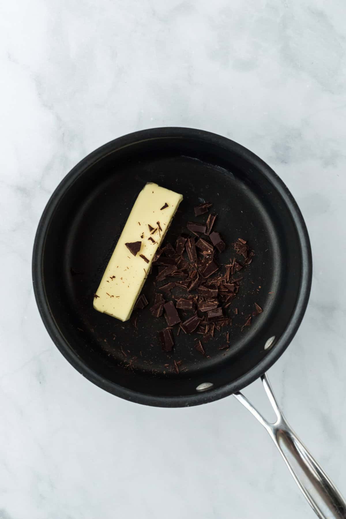 Butter and chocolate in a pot before melting