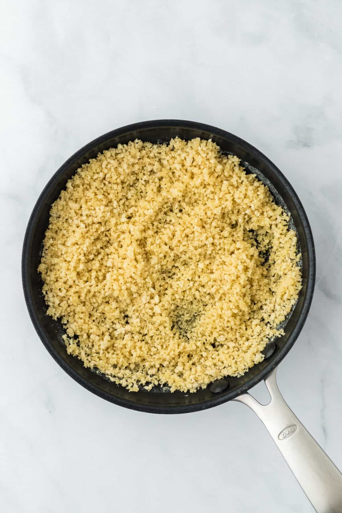 Panko browned in a skillet with butter and garlic