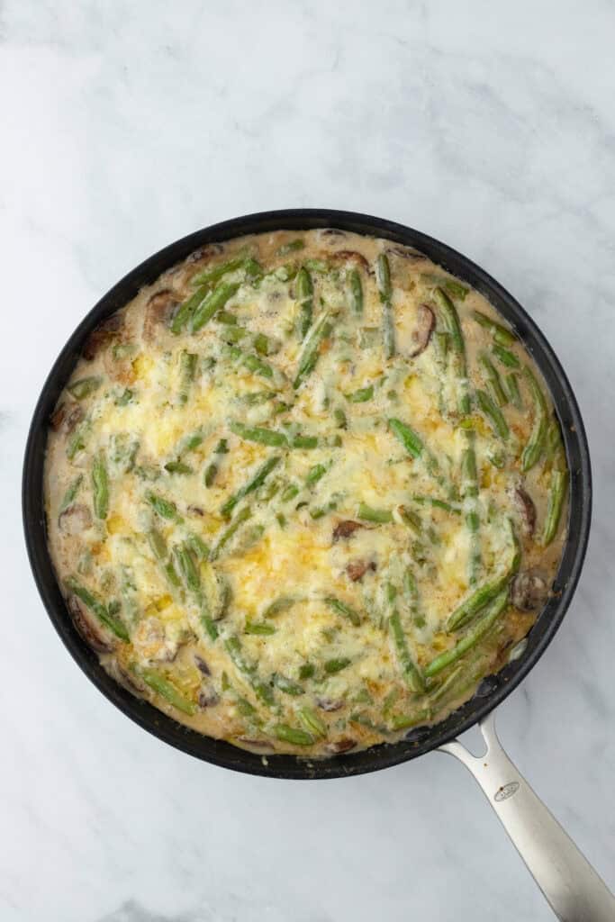Cheesy green bean casserole after baking in oven for 20 minutes
