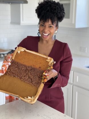 Jocelyn Delk Adams holding a sheet pan pie after baking for a segment on the today show