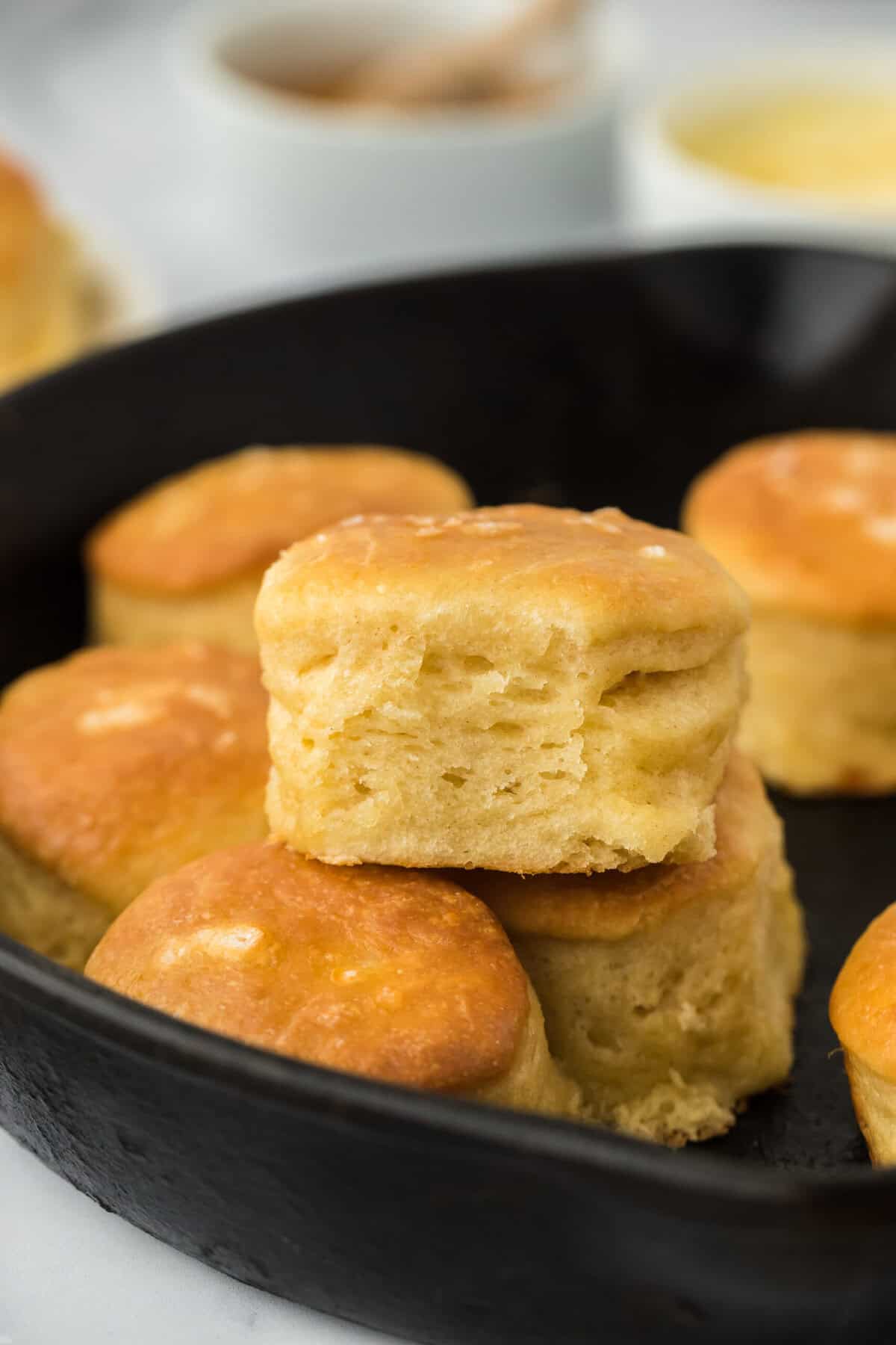 Stacked angel biscuit recipe in a cast iron skillet out of the oven