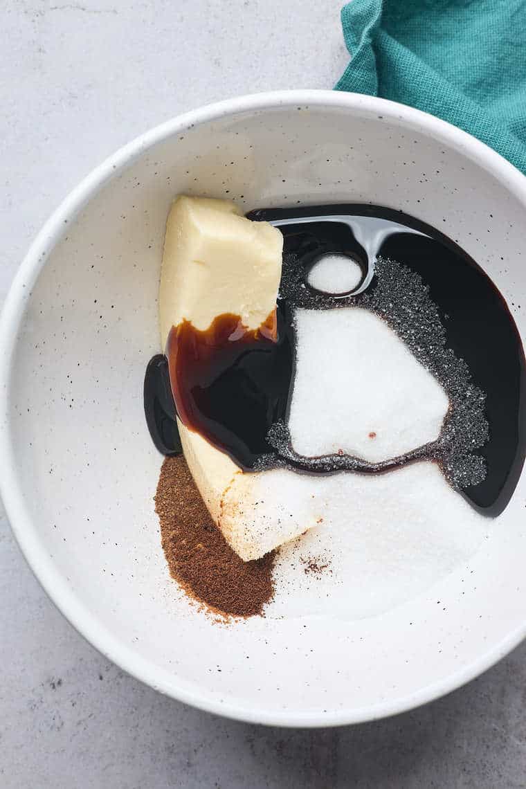 Butter, molasses, sugar and spices in a large white bowl