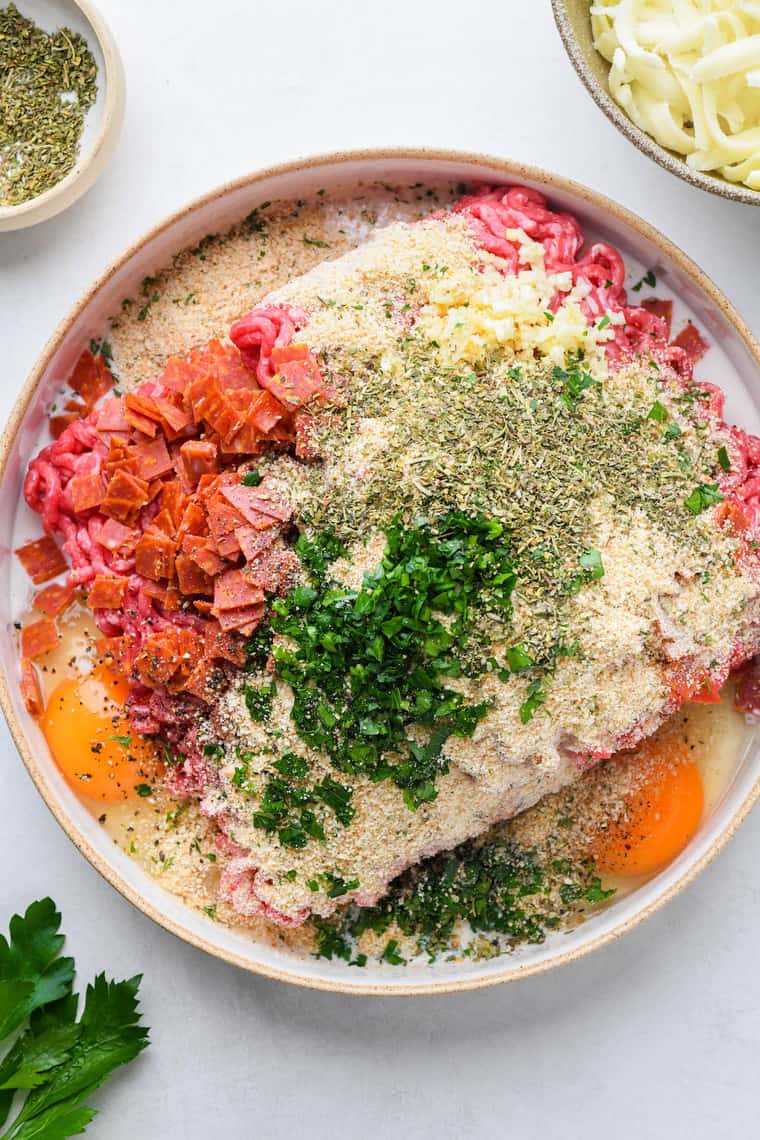 A pound of ground turkey, breadcrumbs, herbs and spices to blend together