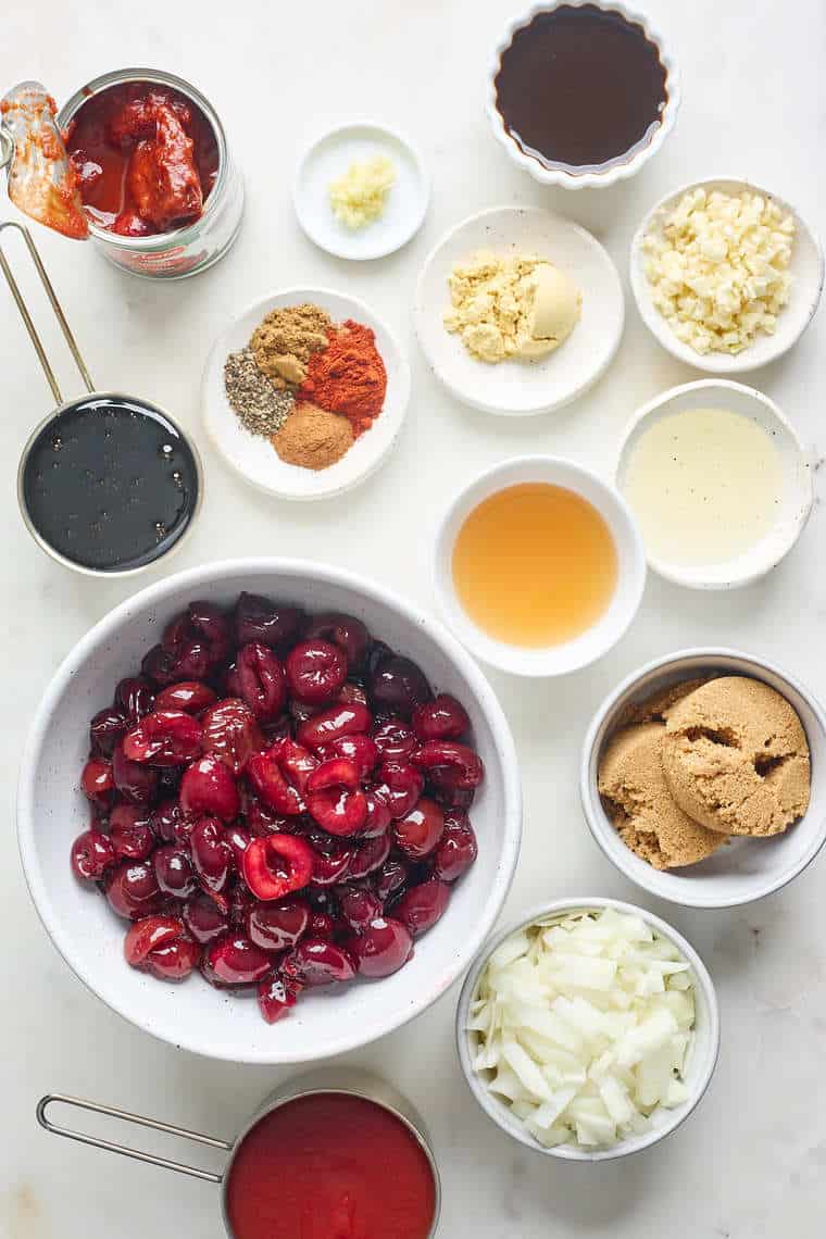 Cherries, brown sugar, spices, onion and garlic before making a barbecue sauce