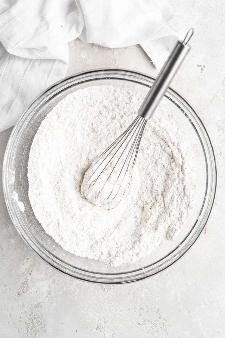 Dry ingredients for a cake being whisked together