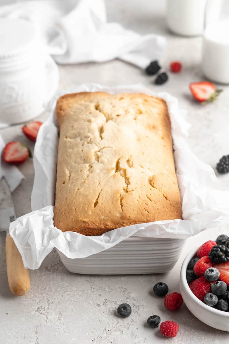 A delicious sour cream pound cake after being baked in a loaf pan