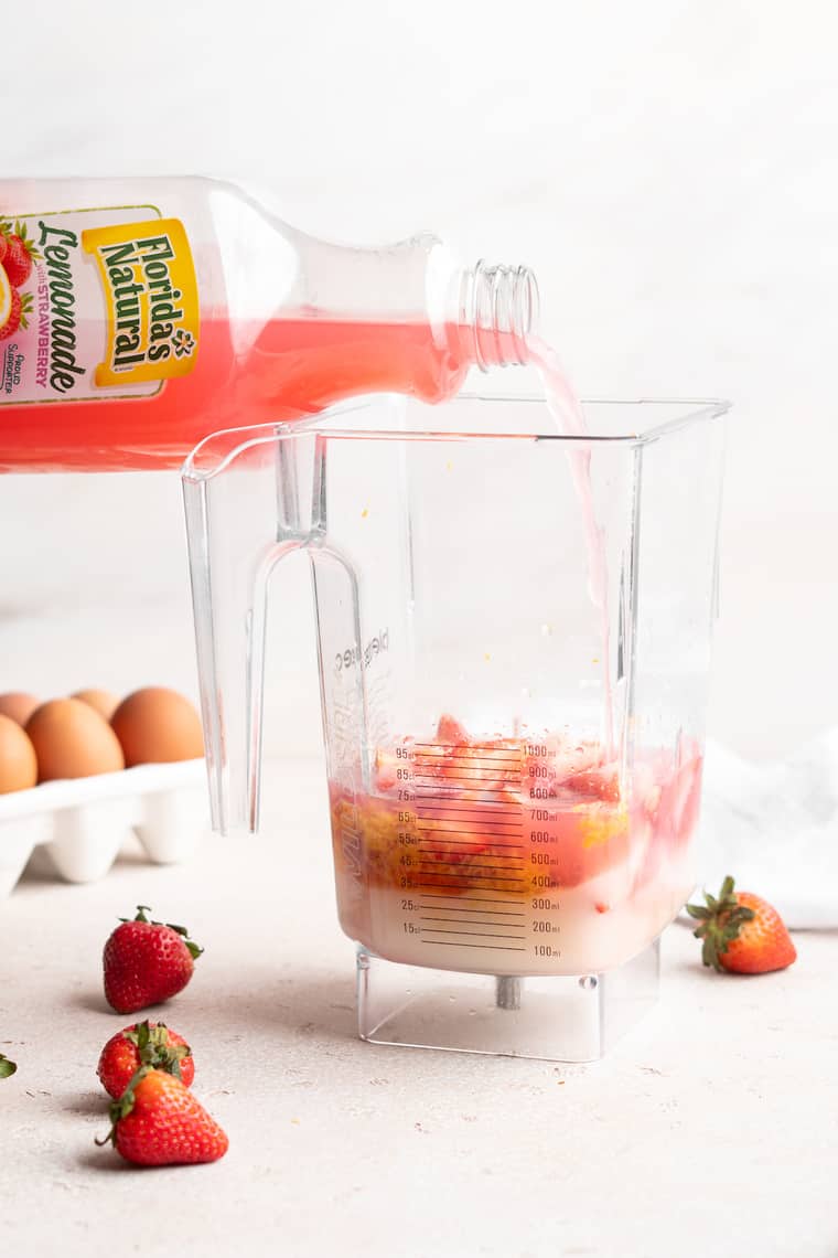 Lemonade being poured into a blender