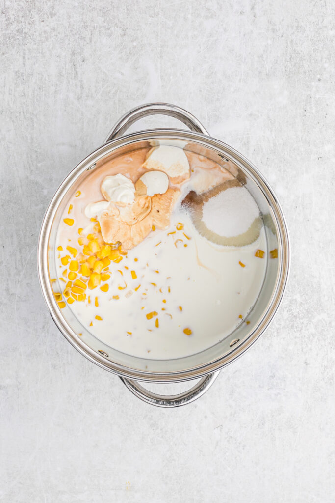 A large pot with half a half, sugar, salt and vanilla to begin an ice cream custard base