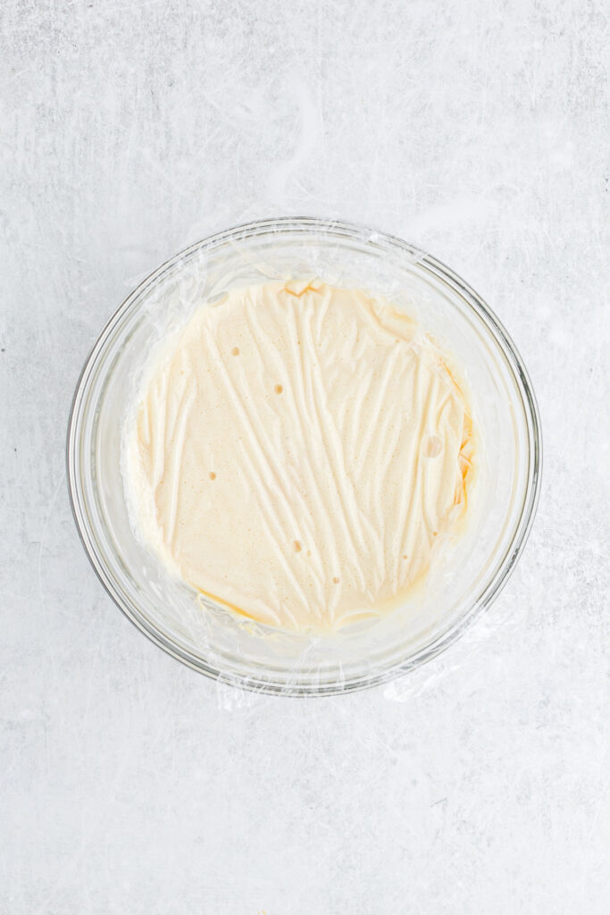 Ice cream base chilling with plastic wrap over it