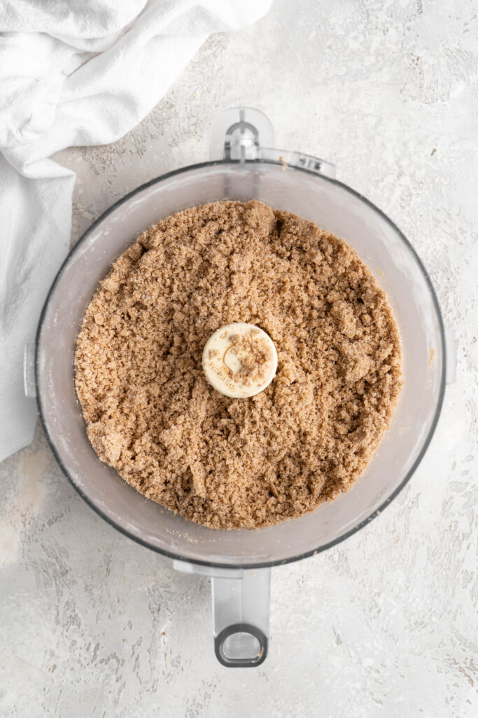 A buttery brown sugary crumble just pulsed in a food processor