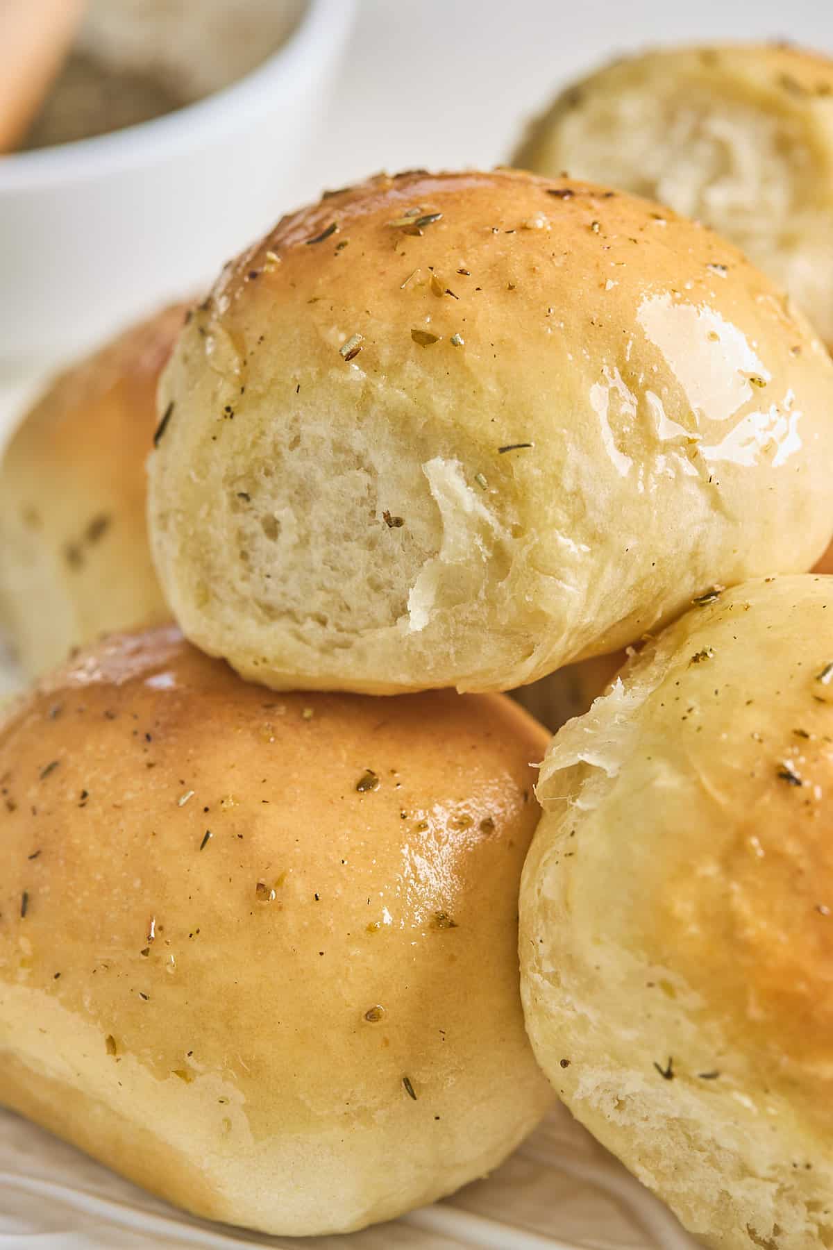 Dinner rolls are stacked on top of each other