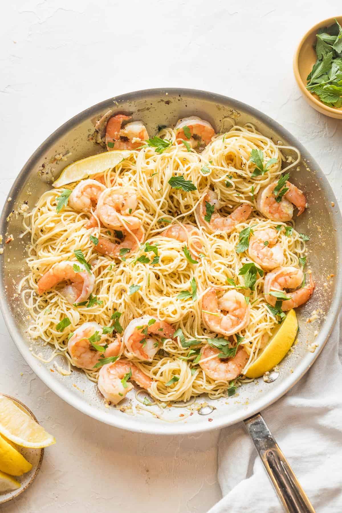An easy shrimp scampi pasta in a white bowl ready to serve