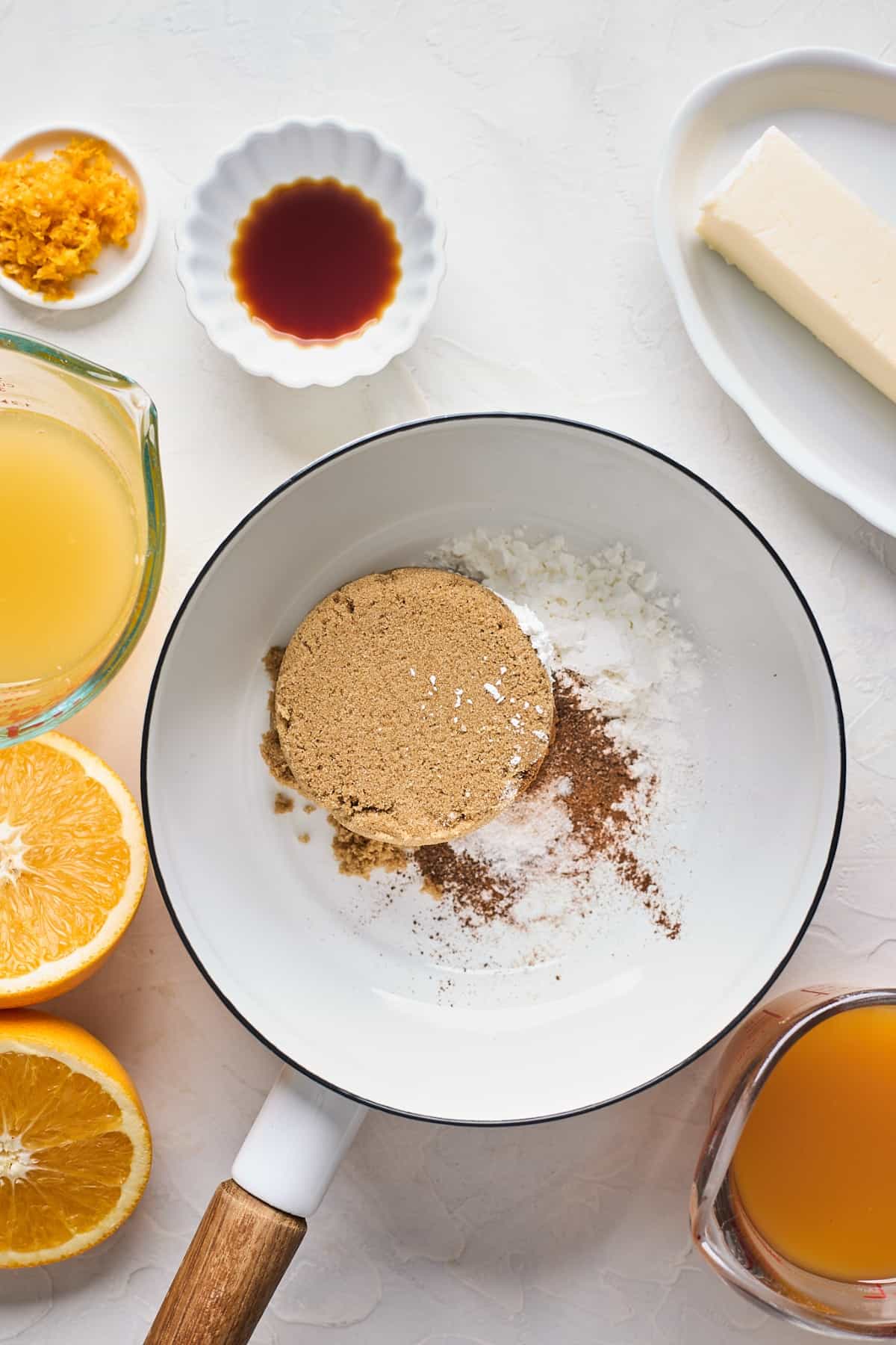 Brown sugar and flour in a small saucepan to make cobbler filling.