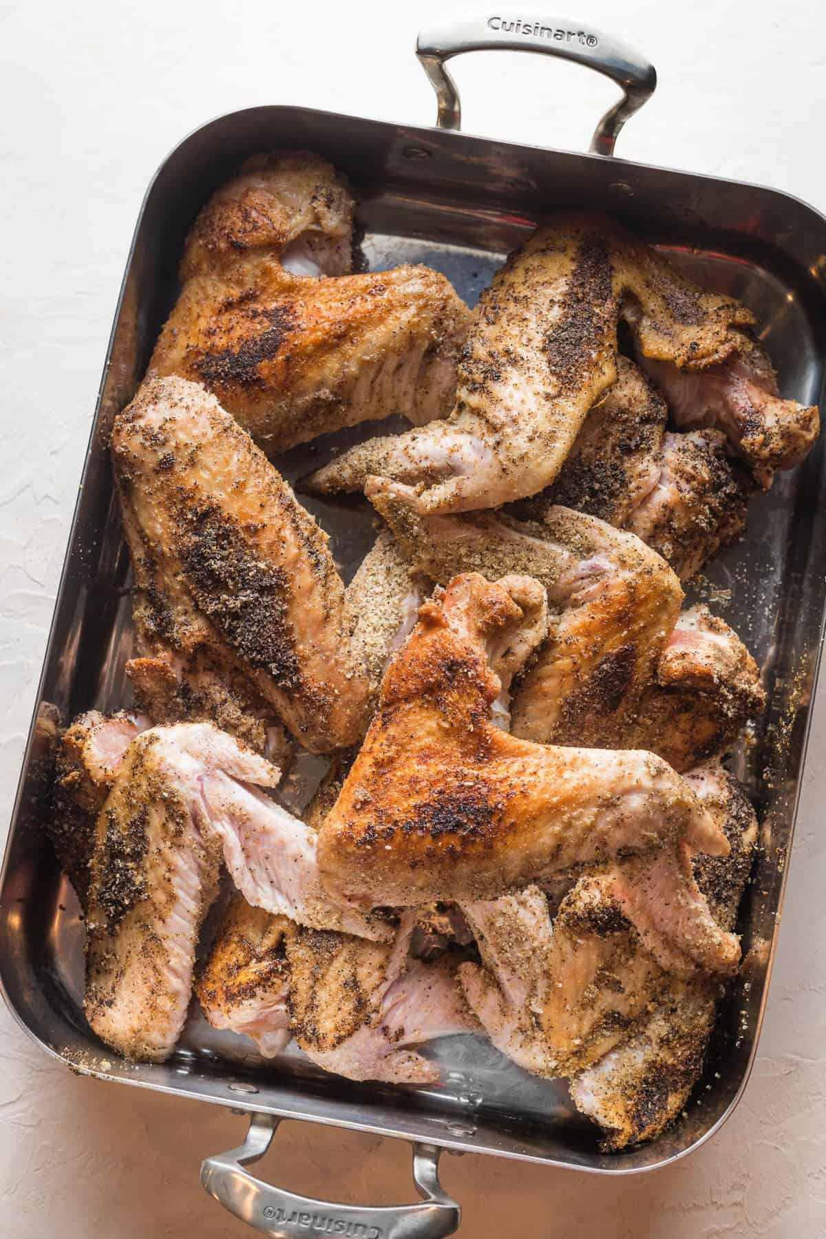 roasted turkey wings in a large baking dish