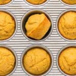 Baked sweet potato cornbread muffins in the pan cooked and ready to eat.