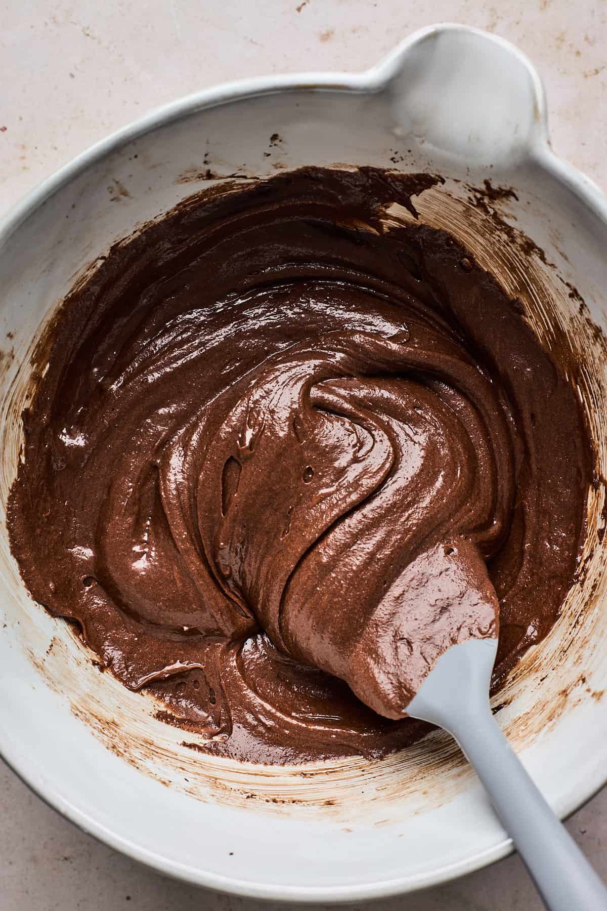 chocolate swirl mixture being mixed in a bowl