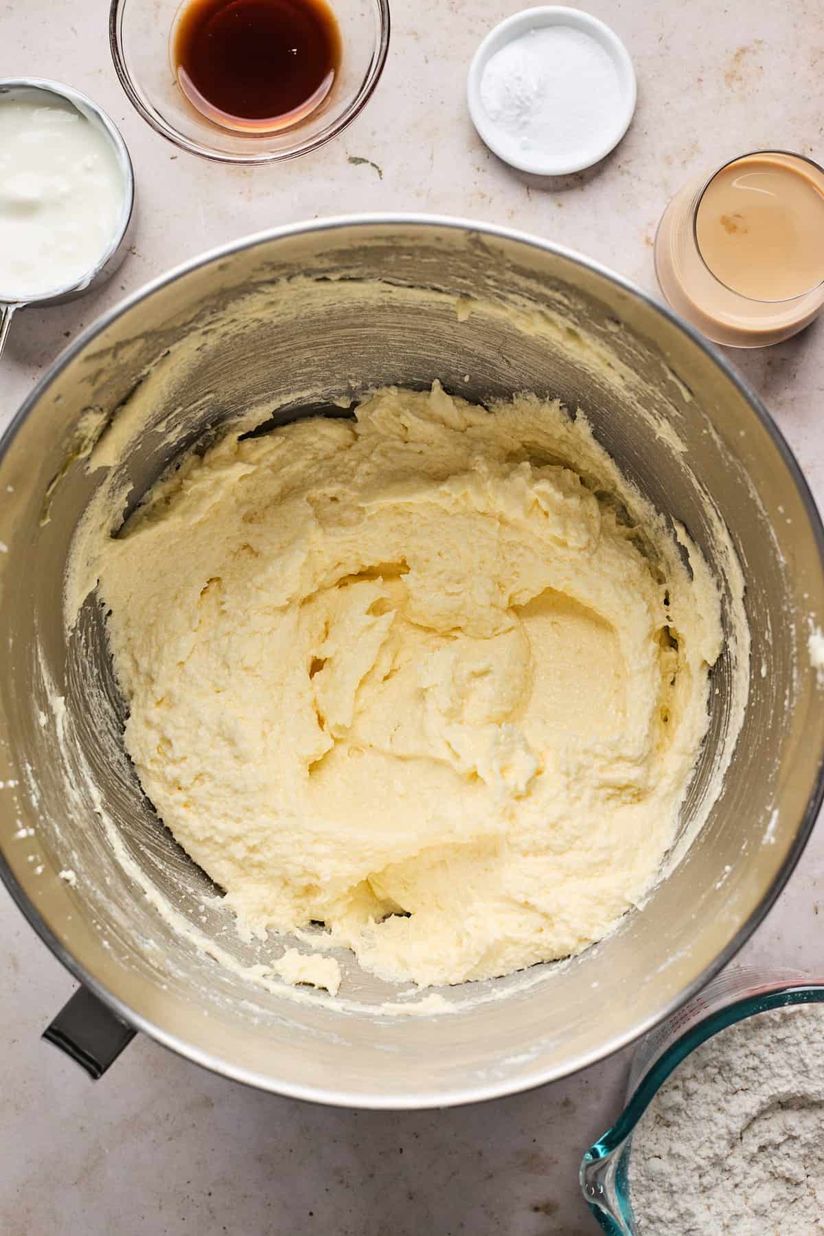 pound cake batter being mixed in a large bowl