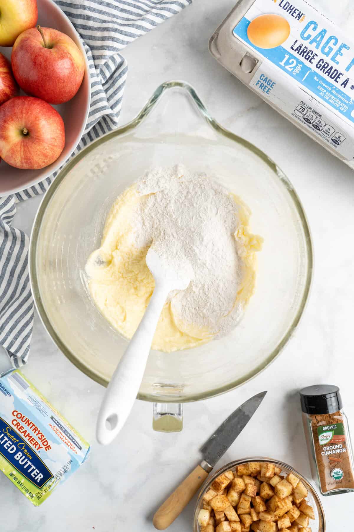 Dry ingredients added to bread batter in stand mixer