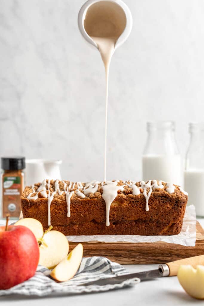 Spiced icing being poured over a cake
