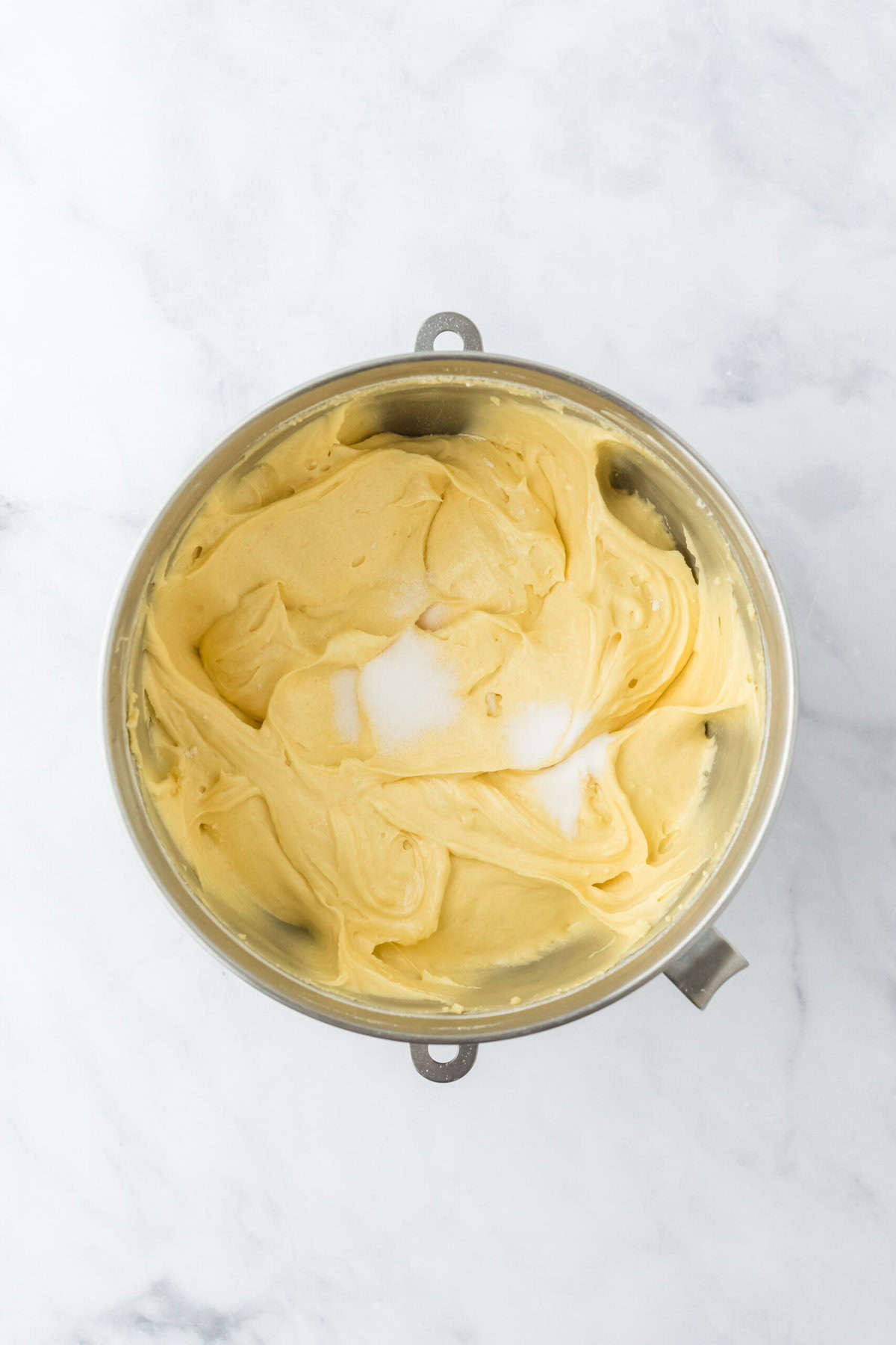 Baking soda and salt added to cake batter in stand mixer